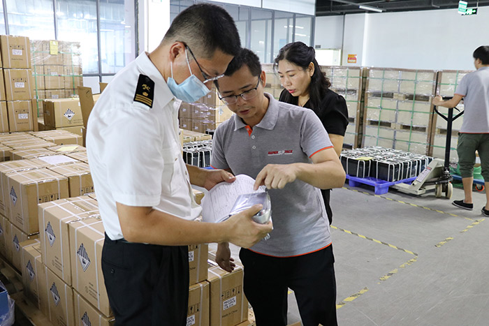 Customs officials are checking  packaging of lithium ion batteries